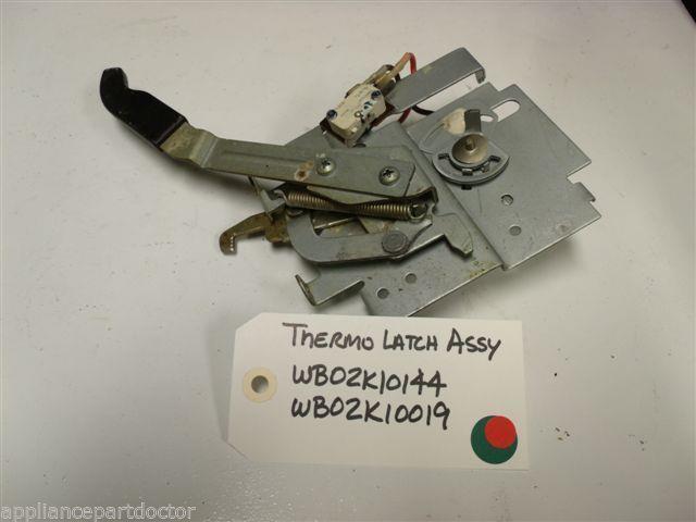 GE STOVE WB02K10144 /  WB02K10019 Thermo Latch USED PART ASSEMBLY