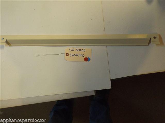 FRIGIDAIRE STOVE 316081302 Shield-oven Door, Almond, Top    USED