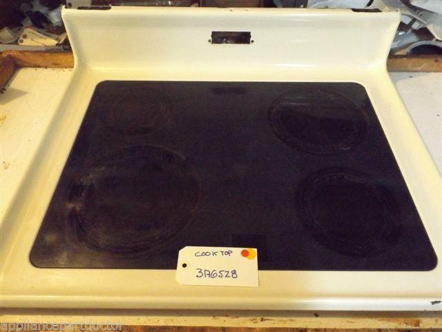 WHIRLPOOL STOVE  3176528 COOKTOP ALMOND  FINISH DAMAGE  USED