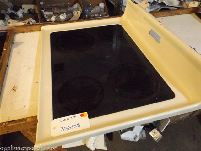 WHIRLPOOL STOVE  3176528 COOKTOP ALMOND  FINISH DAMAGE  USED