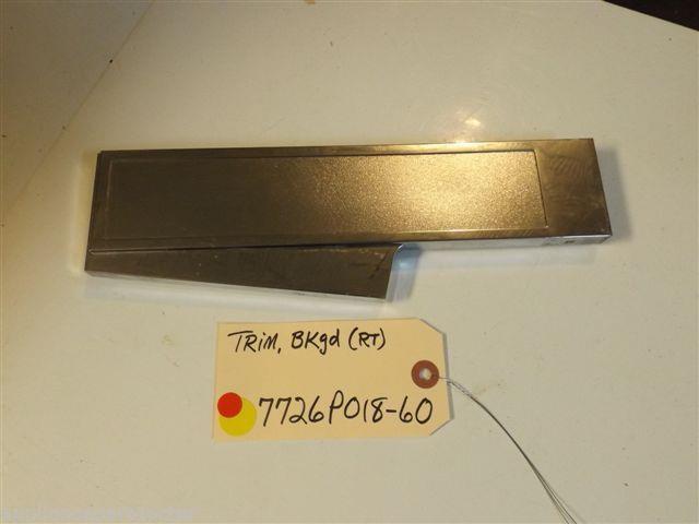Magic Chef  STOVE 7726P018-60  Trim, Bkgd. (rt) scratches from use   used