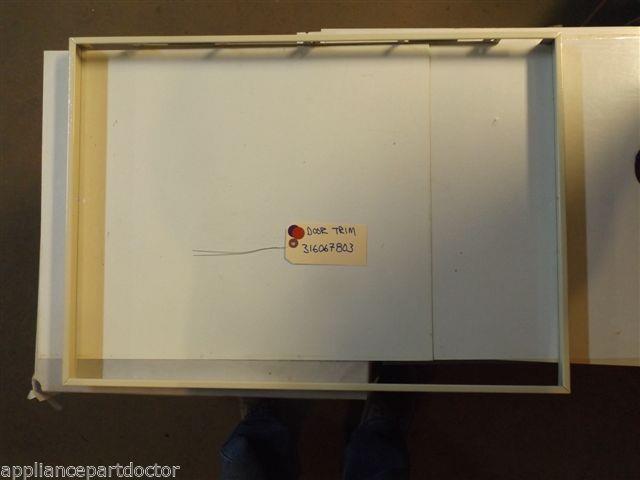 FRIGIDAIRE STOVE 316067803 Trim-oven Door, Almond      USED