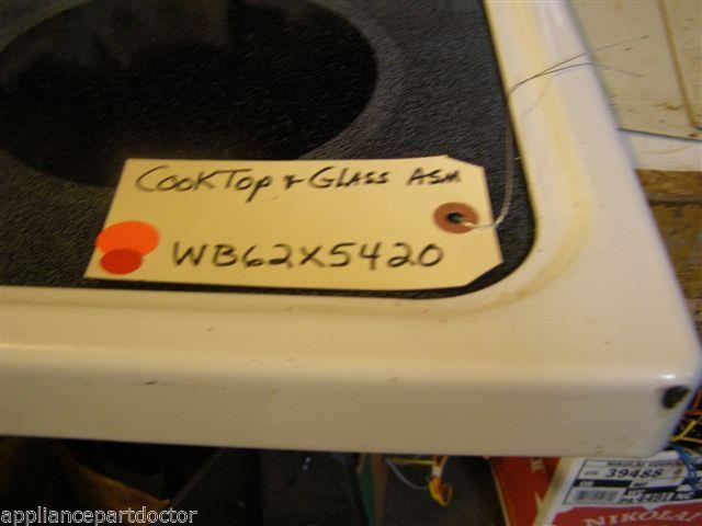 GE STOVE   WB62X5420  Cooktop & Glass Asm Chips in paint/Glass Good   used