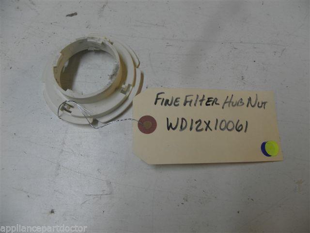 GE DISHWASHER WD12X10061 NUT HUB FINE FILTER USED PART ASSEMBLY