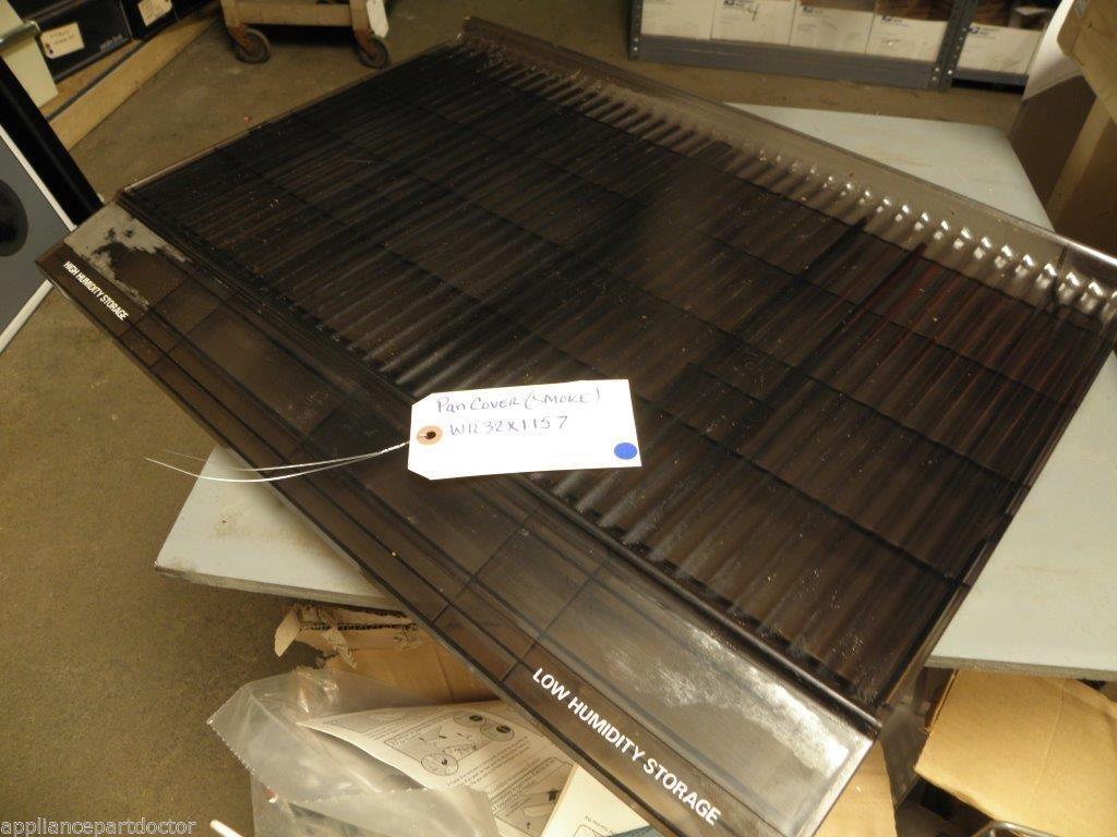 REFRIGERATOR WR32X1157 PAN COVER (smoke)   USED PART