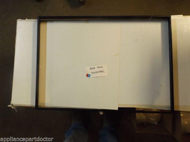 FRIGIDAIRE Stove 316067802 Trim,oven Door ,black  USED