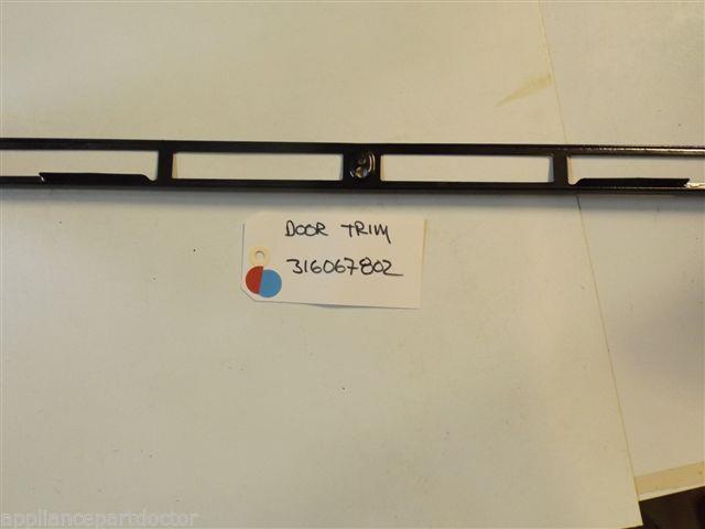 FRIGIDAIRE Stove 316067802 Trim,oven Door ,black  USED