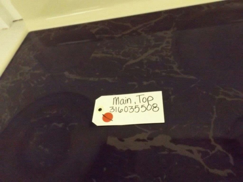FRIGIDAIRE STOVE 316035508 MAIN, TOP (OFF-WHITE) USED (SMALL MARKS)